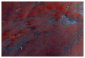 Possible Hematite-Rich Deposits along Crater Wall and Floor in Capri Chasma