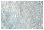 Exposures of Layered Bedrock West of Hellas Planitia