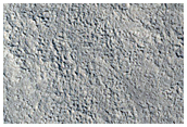 Channel in Mamers Valles Crater with Phyllosilicates