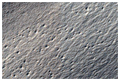Scarp Likely Exposing Polar Layered Deposits in Area Not Well Observed