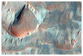 Megabreccia and Layered Deposits in Holden Crater