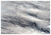 Crater with Lobate Ejecta and Windstreaks