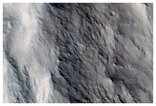 Transitional Debris Flow and Gully Features