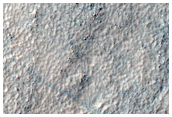 Olivine-Rich Wall Rock of Icaria Fossae and nearby Crater Wall