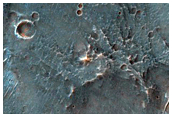 Olivine-Rich Crater and Plains in Thaumasia Planum