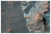Central Pit of an Impact Crater with Layered Bedrock