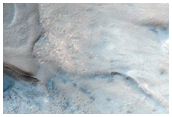 Crater with Material on Floor near Argentea Planum