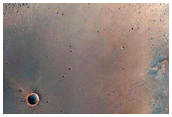 Two Craters Exposing Bedrock in Northeast Syrtis Major