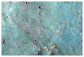 Light-Toned Material along Valley near Coprates Catena