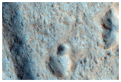 Layered Cliffs and Possible MSL Rover Landing Site in Libya Montes