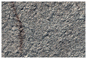 Polar Layers Exposed on Promethei Lingula Surface