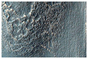 Tongue-Shaped Flow Feature in Hellas Montes Region