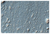 Fractured Mesas on Floor of Crater West of Hellas Planitia