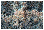 Possible Olivine on Floor of Crater in Northern Hellas Planitia