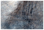 Malea Planum Pedestal Crater and Landforms
