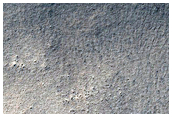 Crater with Mound Apparently Exceeding Rim Height
