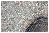 Gullies and Textured Crater Floor in MOC E12-03439 and R12-01704