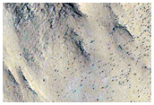 Deposit with Possible Layers in Crater in Arabia Region
