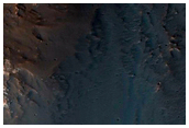 Bedrock Exposures in 20-Kilometer Diameter Crater in Kasei Valles
