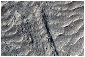 Tongue-Shaped Flow Features in Terra Cimmeria
