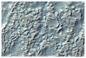 Crater Wall Features in Aonia Terra