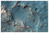 Possible Prehnite and Smectite-Rich Terrain North of Hellas Planitia