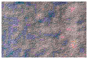 Possible Exposures of Polar Layered Deposits in Area Not Well Observed