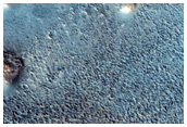 Contact between Materials of Contrasting Albedo