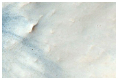 Small Recent Crater on Floor of Larger Crater
