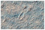 Possible Olivine-Rich Terrain in Buried Crater in Terra Sirenum