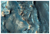 Possible Mafic and Carbonate-Rich Terrain in Northeast Syrtis Region Basin