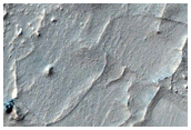 Rocky Crater Floor Deposit with System of Ridges