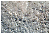 Fractured Crater Near Alba Patera