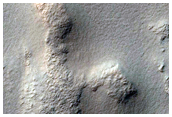 Greater Terra Sirenum Crater Rim or Escarpment