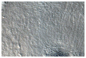 Layered Deposits Beside Mounds