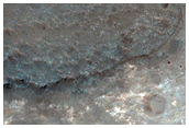 Light-Toned Phyllosilicates along Plains at Coprates Catena