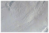 Layered Material in Crater as Seen in CTX Image 