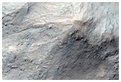 Central Peak of Unnamed Crater in Thaumasia Planum Mountains