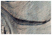 Banded Landforms in Gullied Kampot Crater
