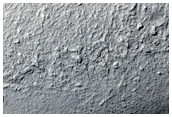 Tongue-Shaped Flow Feature on Mound in Terra Cimmeria