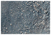 Possible Tongue-Shaped Flow Feature Forming Northeast of Reull Vallis