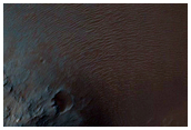 Hematite and Mantle Units in Capri Chasma