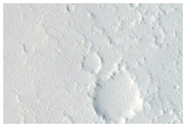 Cross-Cutting Wrinkle Ridge and Graben in Nilus Chaos