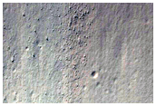 Small Crater in Mantled Material