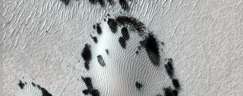 Channel Cutting Crater Wall in Nereidum Montes