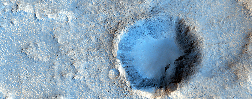 Impact at Edge of Crater Floor Deposit with Olivine Signature