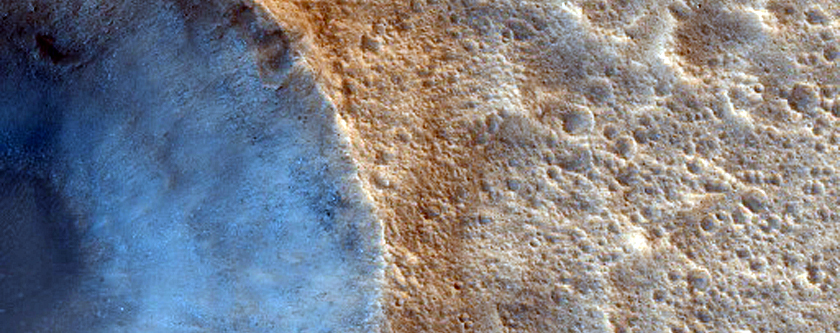 Impact Crater on Apex of Wrinkle Ridge