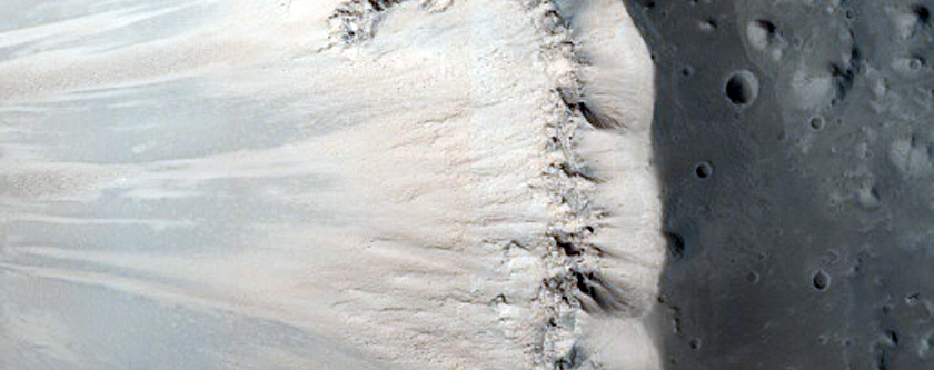 Steep Crater Slope with Bright Flows