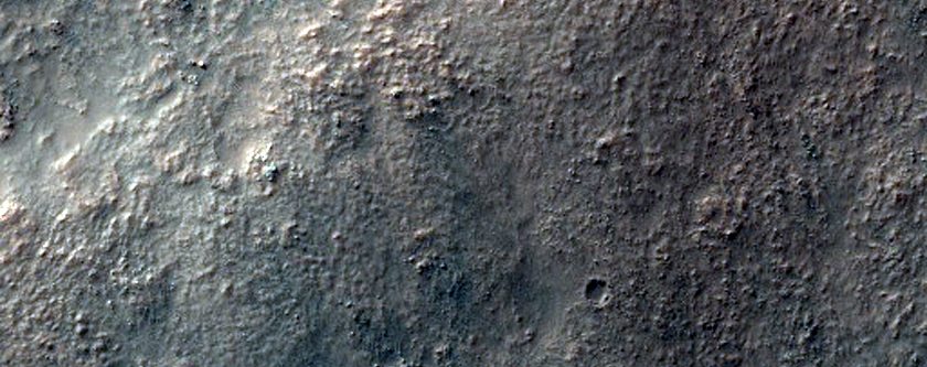 Light-Toned Material on Crater Rim