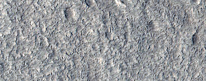 Channel That Appears to Emanate from Impact Ejecta